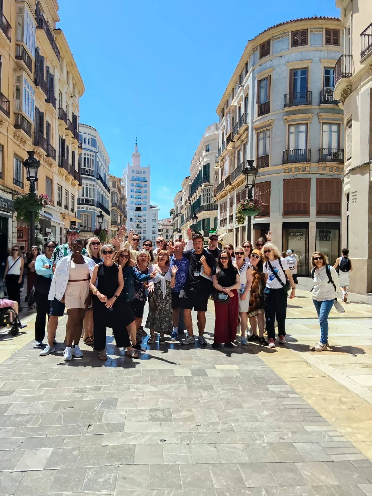 Free tour group with local guide in the famous shopping street calle larios in Malaga