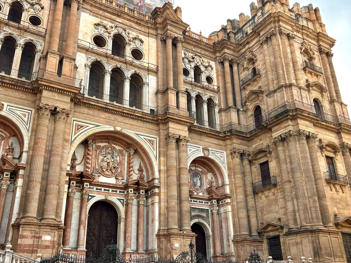 Malaga historic centre sightseeing during free walking tour next to the cathedral in the old town