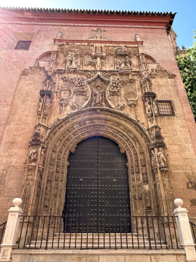 explore the gate of forgiveness in malaga old town during the free walking tours