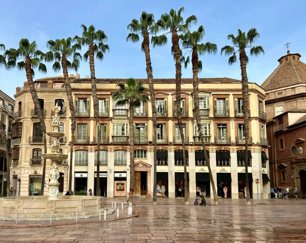 Meet your tour guide in the heart of malaga in plaza de la constitucion for the historic centre free tour