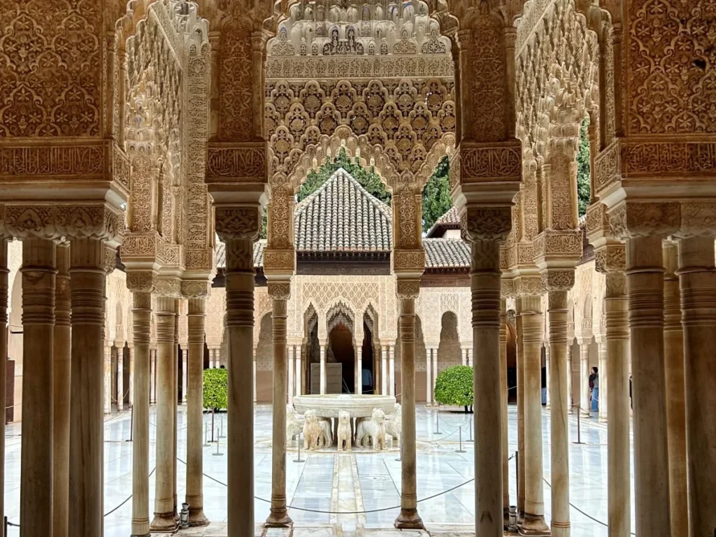 Court of the Lions inside the Nasrid Palaces at the Alhambra in Granada trip from malaga