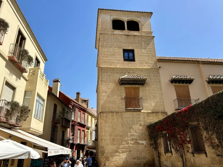 Side view of the Museo Picasso Málaga tower at Palacio de Buenavista in Málaga's historic centre with ticket office behind